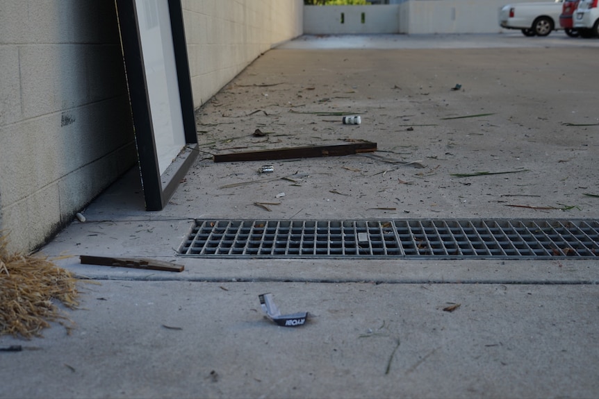 Bits of furniture splattered around a wall.