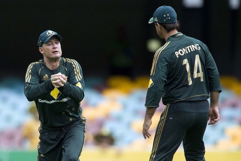 Ricky Ponting, right, looks on as Michael Clarke takes a catch