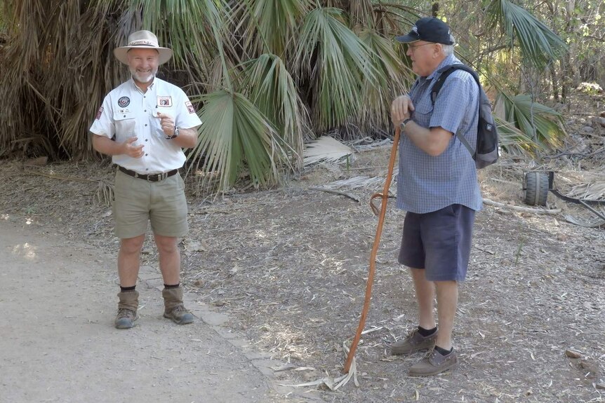 Man in nature guide uniform with a park visitor