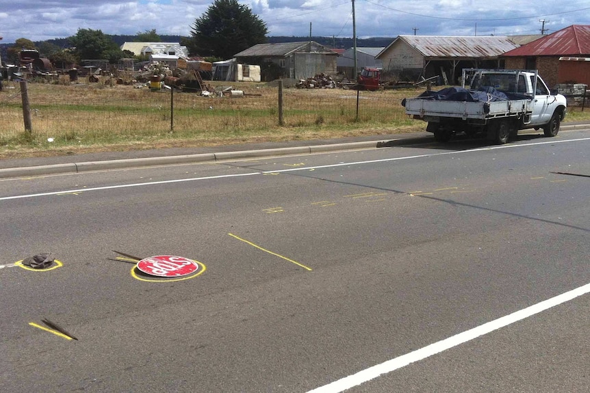 A stop sign lies on a Launceston road where Terrence Close was hit by a ute.