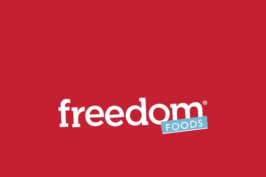 Freedom Foods logo over a red background