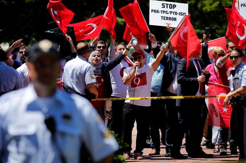 A group of pro-Erdogan demonstrators shout slogans