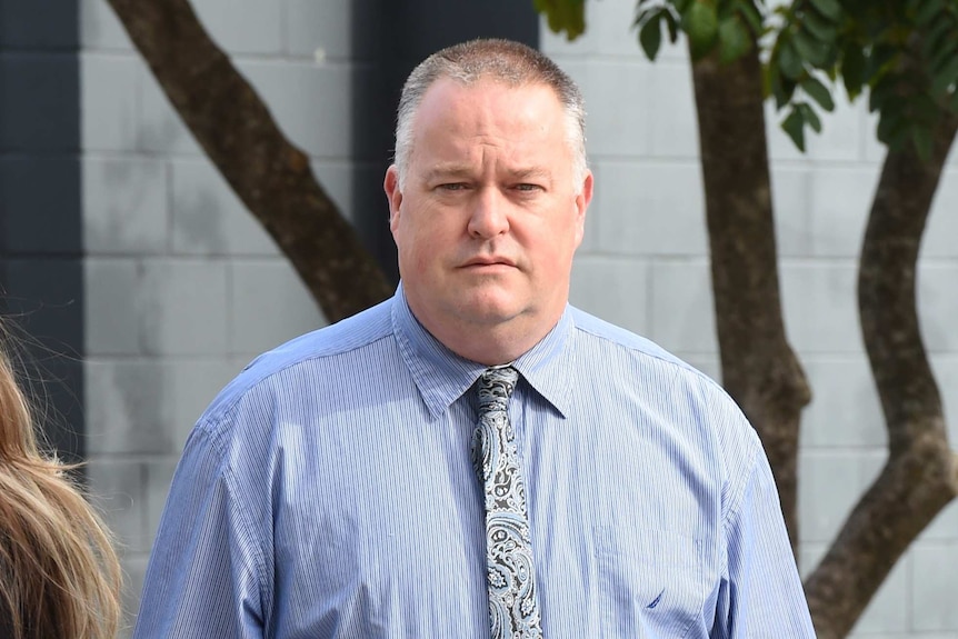 Policeman Rick Flori leaves the Southport Magistrates Court on the Gold Coast earlier this year.