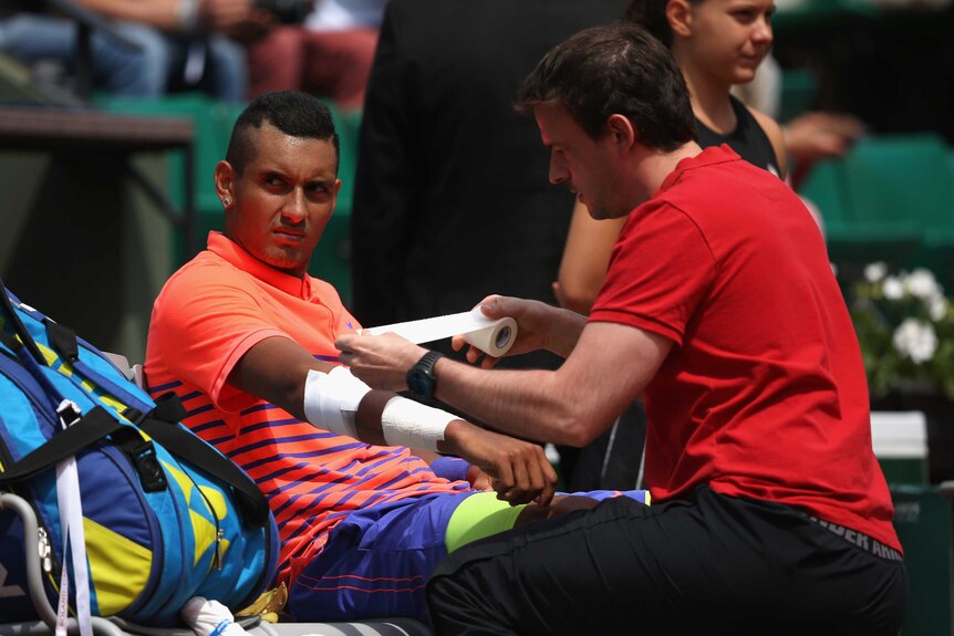 Nick Kyrgios looks on during his French Open clash with Andy Murray