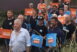 The South Coast Labour Council members standing together outside their headquarters in Wollongong.