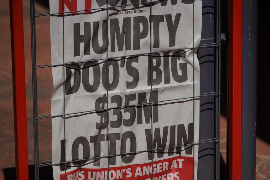 An NT News poster out the front of a shop reads: 'Humpty Doo's big $35 millon lottery win'.