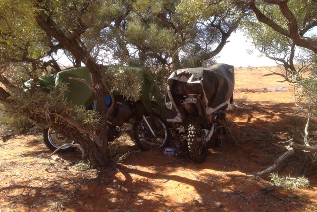 Motorbikes of rescued men left in Simpson Desert