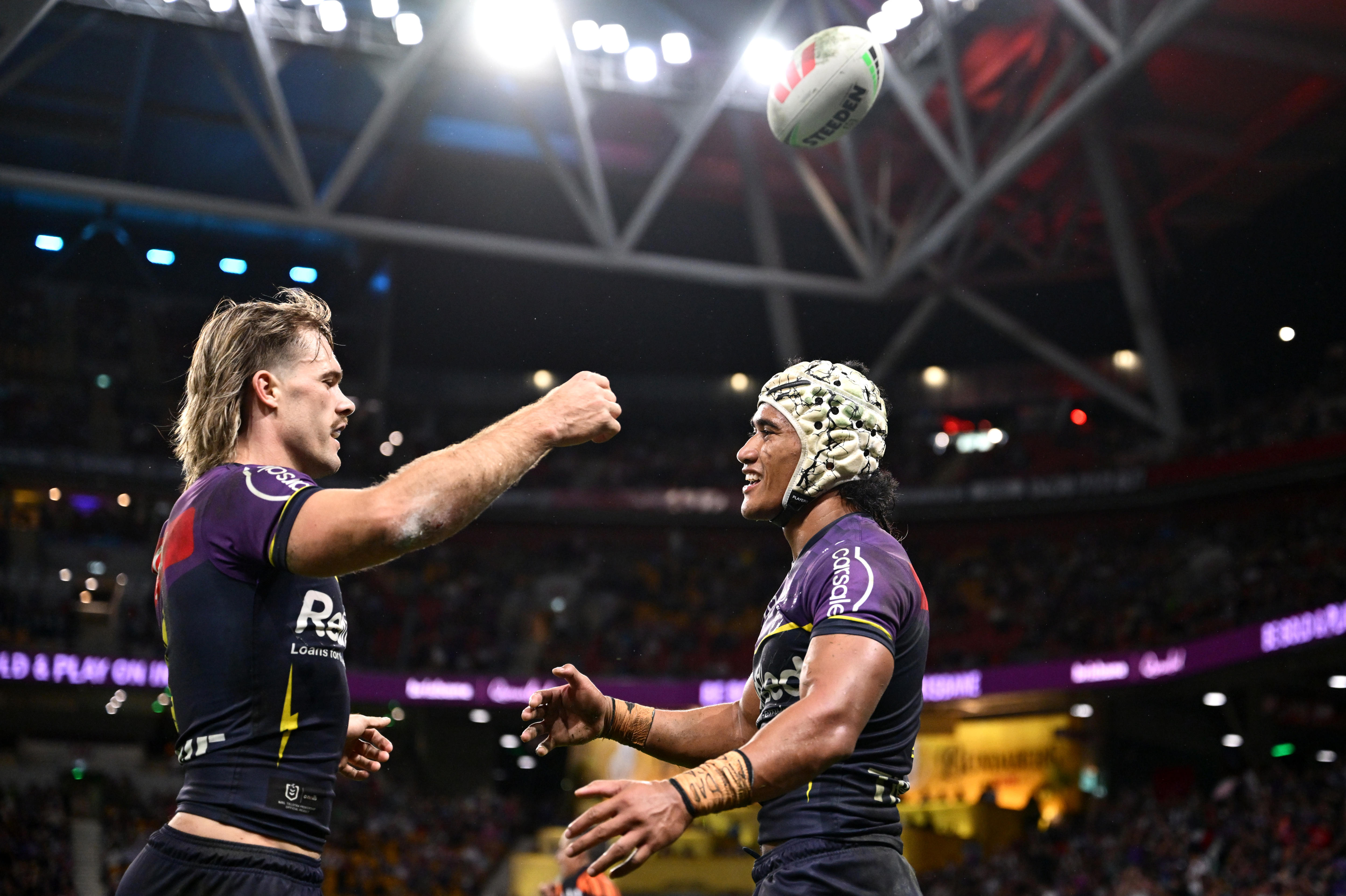 Ryan Papenhuyzen and Sua Fa'alogo embrace after a try 