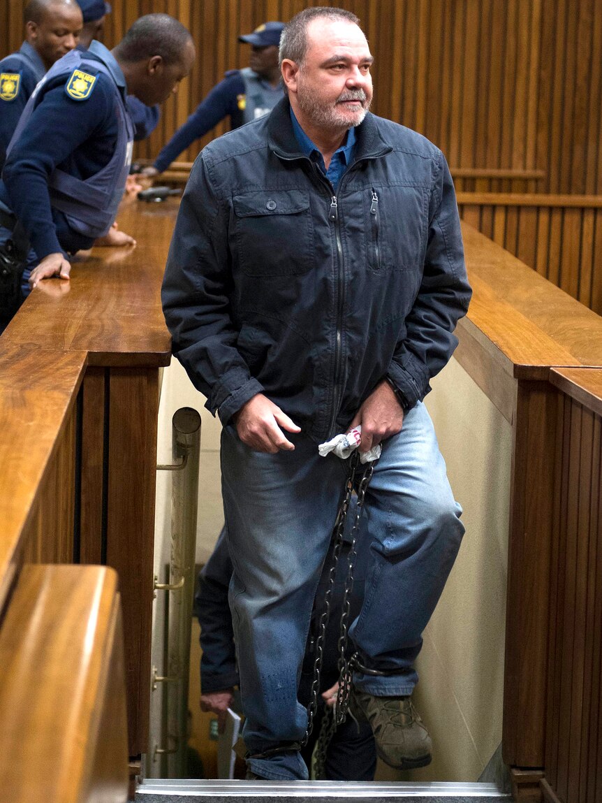 Mike du Toit walks into the courtroom at the Pretoria Hight Court.