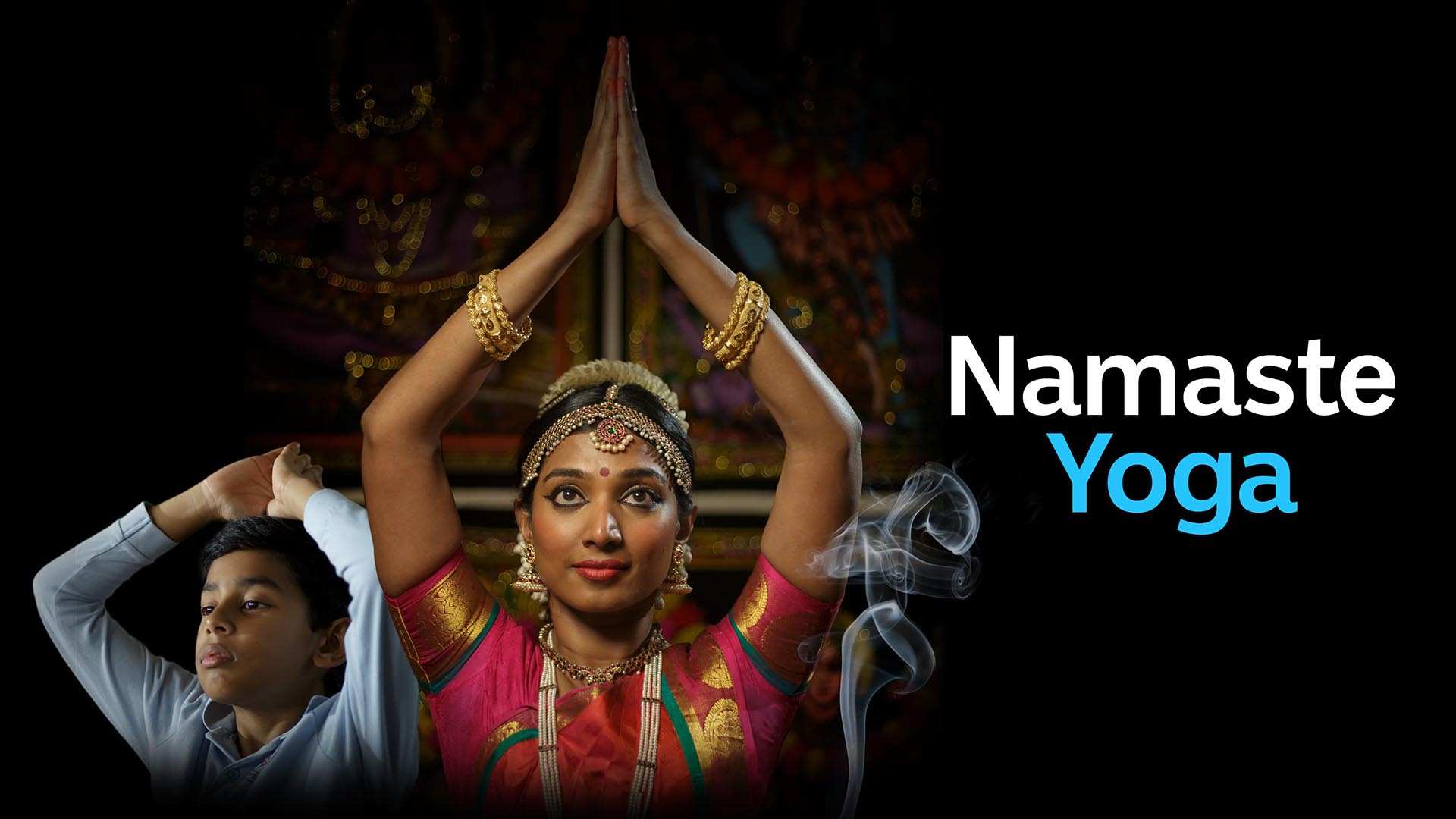 A lady and a child striking a pose with the words Namaste Yoga