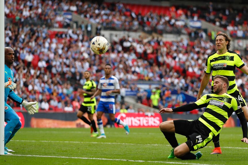 Huddersfield Town's Martin Cranie misses a chance to score.