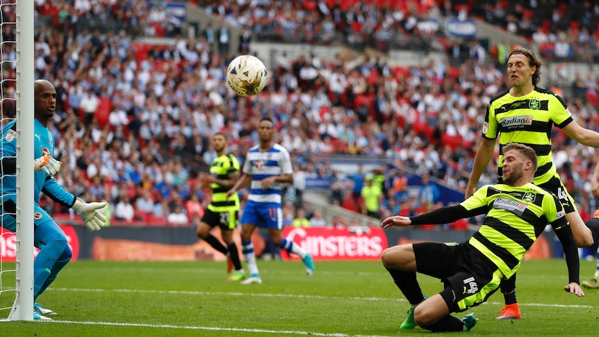 Huddersfield Town's Martin Cranie misses a chance to score.