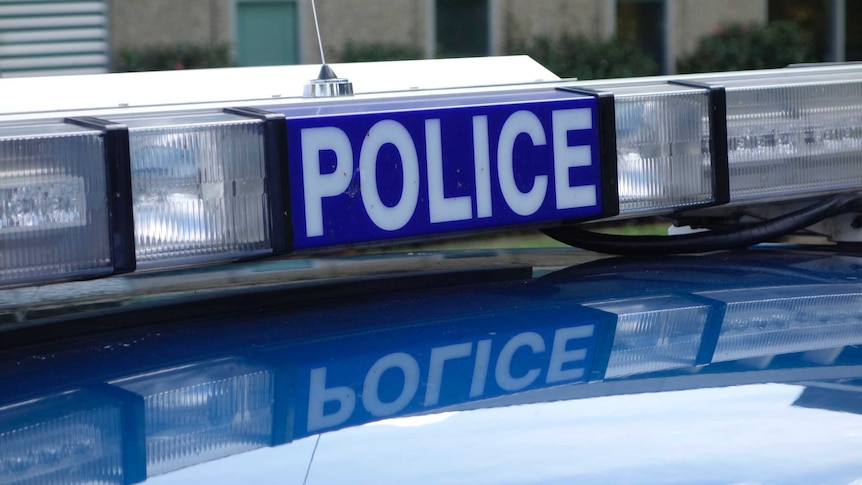 Lights and sign on top of ACT police car in Canberra.