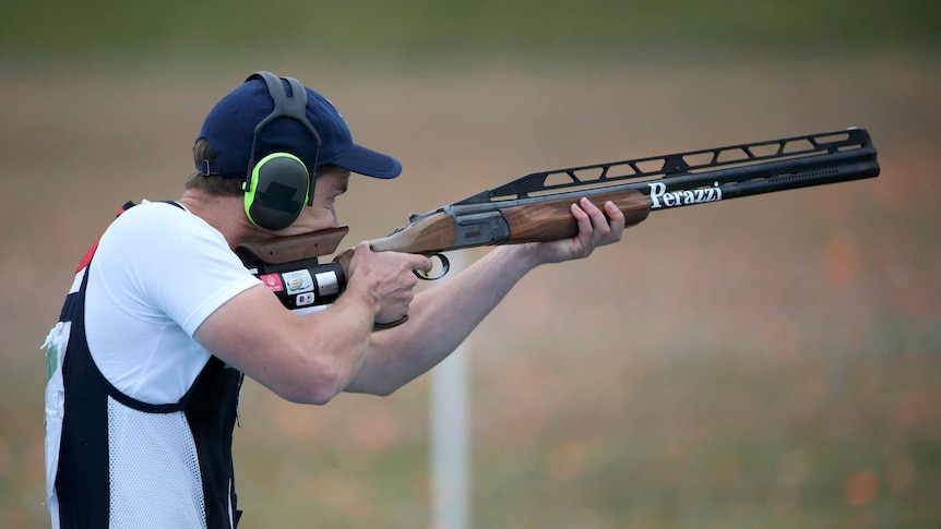 Britain's Tim Kneale competes in qualifying for the men's double trap shooting at the Rio Olympics.
