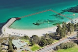A Google Maps aerial shot of Cottesloe Beach showing a red line representing a shark net.
