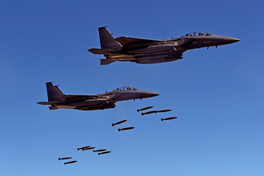 Japanese and South Korean bomber jets in flight.