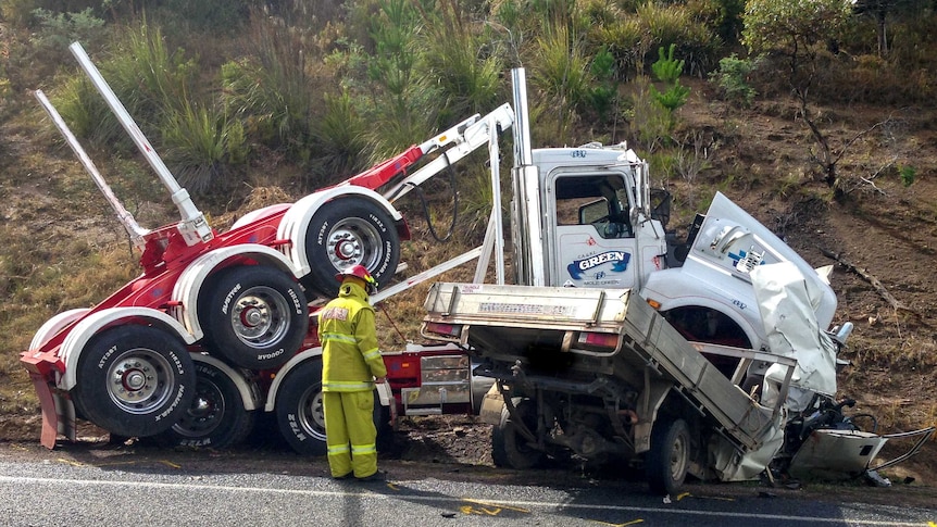 Ute collides with log truck near Launceston