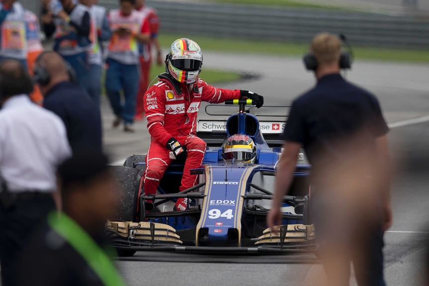 Sebastian Vettel hitches a ride with Pascal Wehrlein after post-race crash in Malaysia