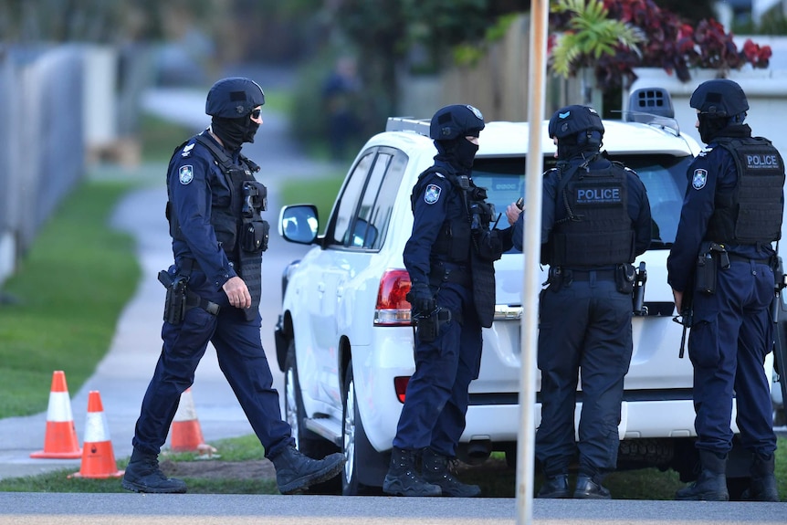 Four police officers in uniform