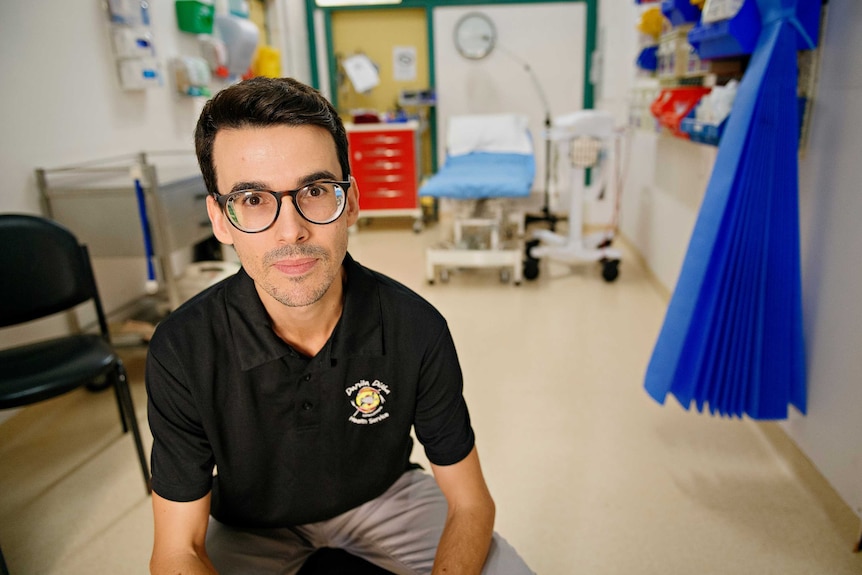 Dr Andrew Webster, the head of clinical governance at the Danila Dilba Health Service, sits in a treatment room at Danila Dilba.