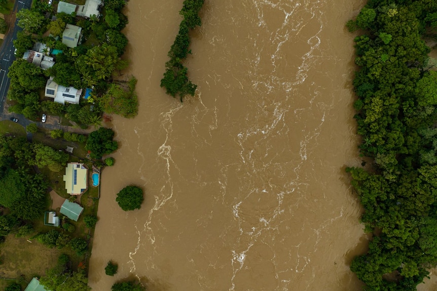 Kamerunga in Cairns aerial, showing swollen river.