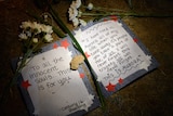 Messages left at the site of a US cinema massacre