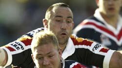 Michael Crocker in action for the Roosters
