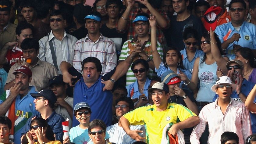 Indian fans make monkey gestures as Andrew Symonds walks out to bat in India, Oct 2007