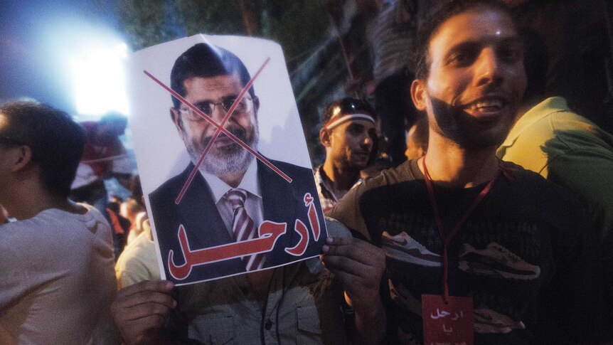 Anti-Morsi protesters celebrate in Tahrir Square
