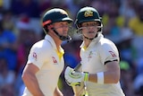Steve Smith and Shaun Marsh run between the wickets on Boxing Day