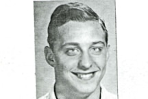 A young white man in a scanned black and white license photo 