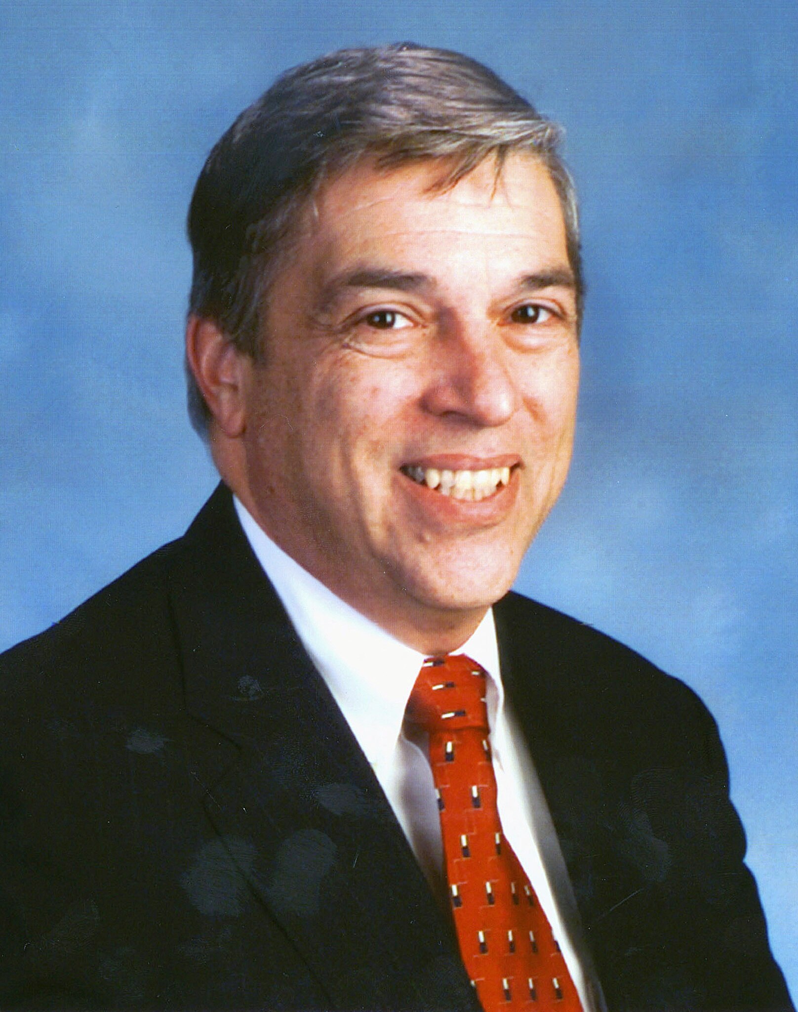 Former FBI agent Robert Hanssen smiles for a portrait photo.