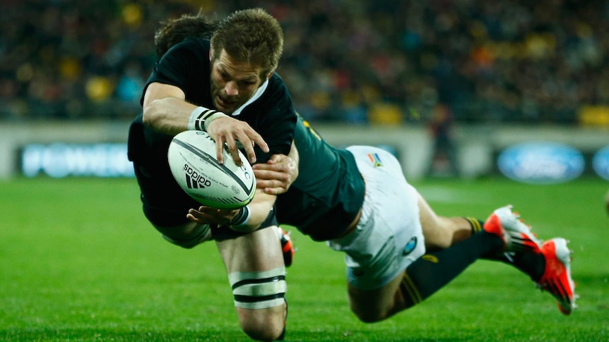 New Zealand's Richie McCaw scores a try against South Africa in Wellington on September 13, 2014.