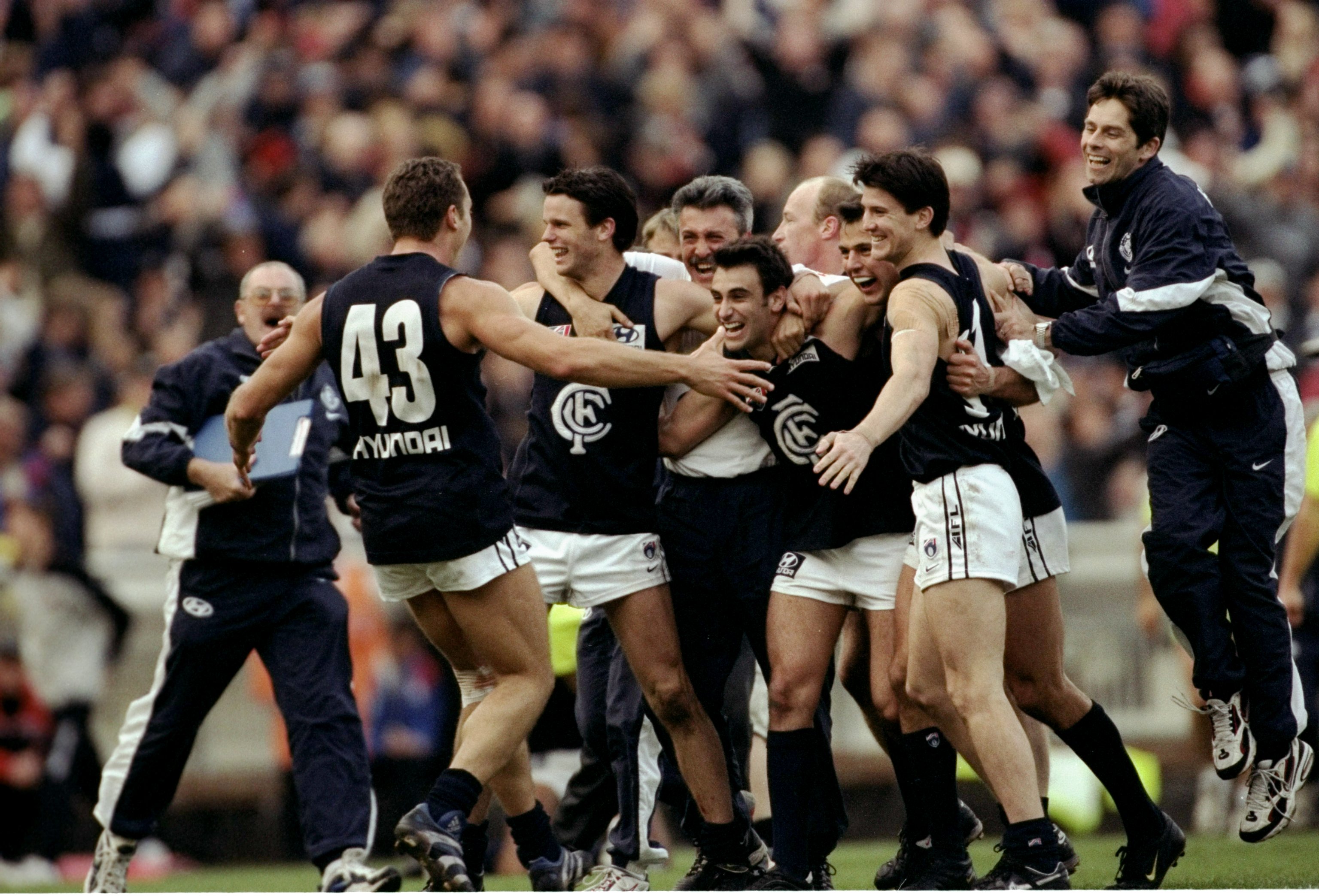 Carlton players celebrate after 1999 preliminary final win