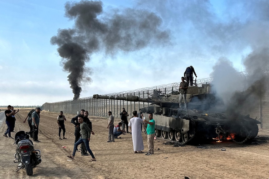 Black smoke in background of tank 