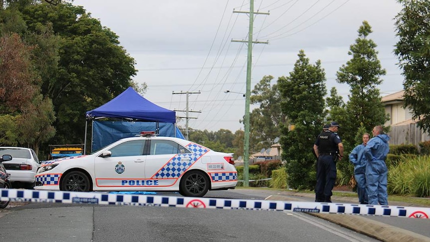 Police officers at the scene of a fatal stabbing in Blyth Road, Murrumba Downs on the morning of July 12, 2018.