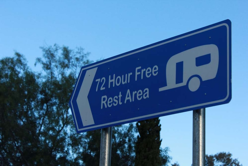 sign that says '72 hour free rest area' with a camper van on it.