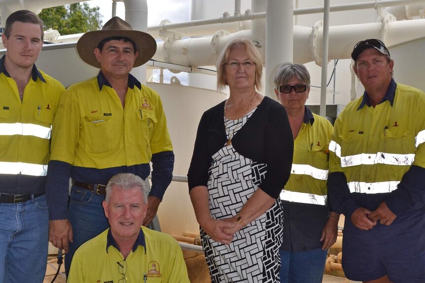 Council workers at the Charters Towers water treatment plant.