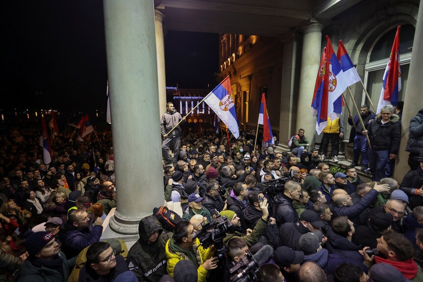 Serbian police fire tear gas at protesters threatening to storm