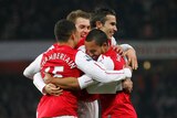 Fighting win ... Arsenal celebrates Theo Walcott's goal against Aston Villa (AFP Photo: Ian Kington)