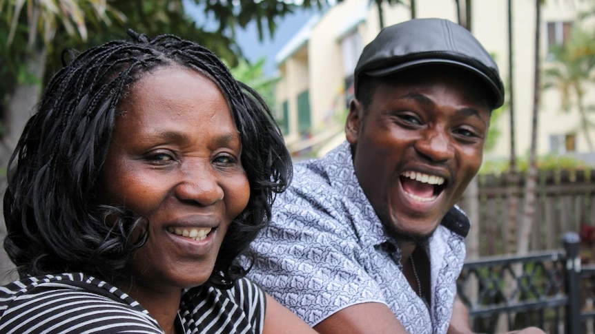 Pascasia Nyirashaka and her son Dennis Bemeliki happy after being reunited in Cairns.