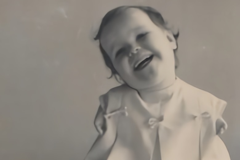 Mary Henley-Collopy as a baby posing for a photo