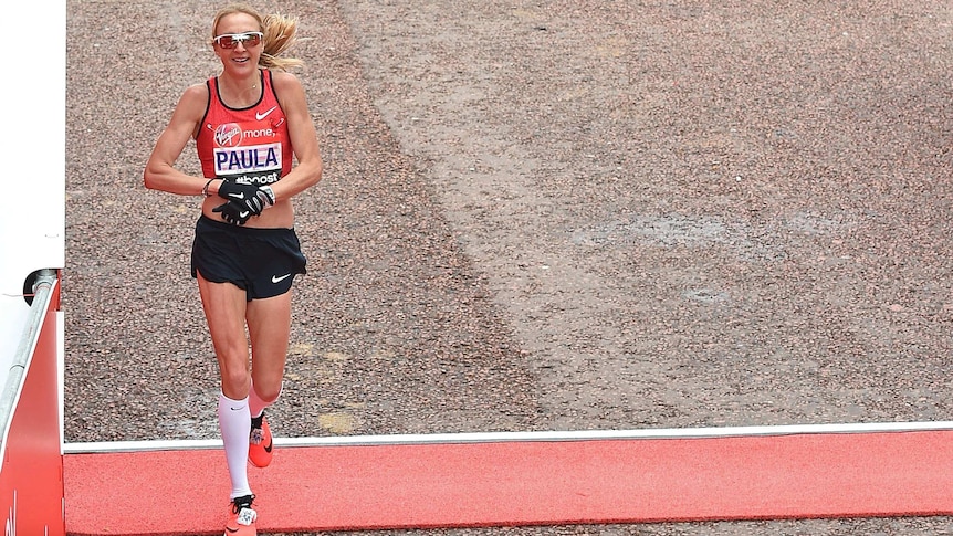 Paula Radcliffe of Great Britain crosses the finish line at London Marathon on April 26, 2015.