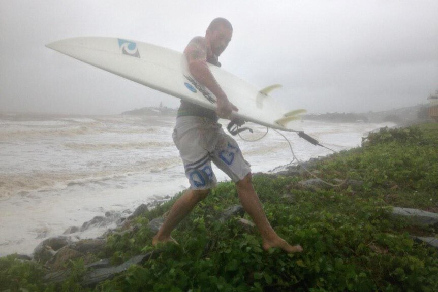 Surfing Cyclone Marcia