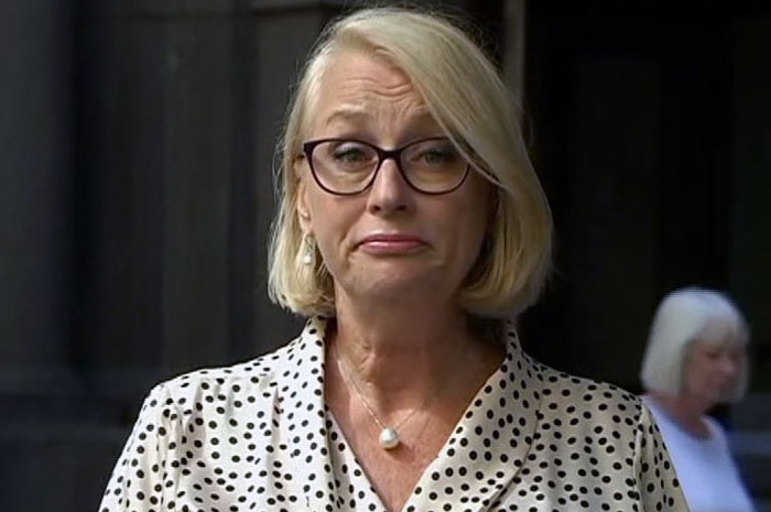 Melbourne Mayor Sally Capp listening at a press conference.