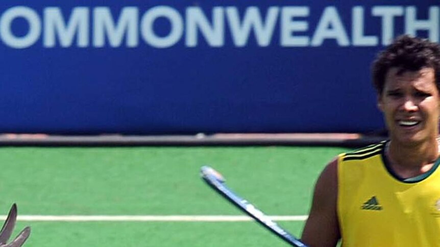 The Australian men's hockey team has advanced to the final at the Commonwealth Games in Delhi with a 6-2 semi-final defeat of New Zealand.