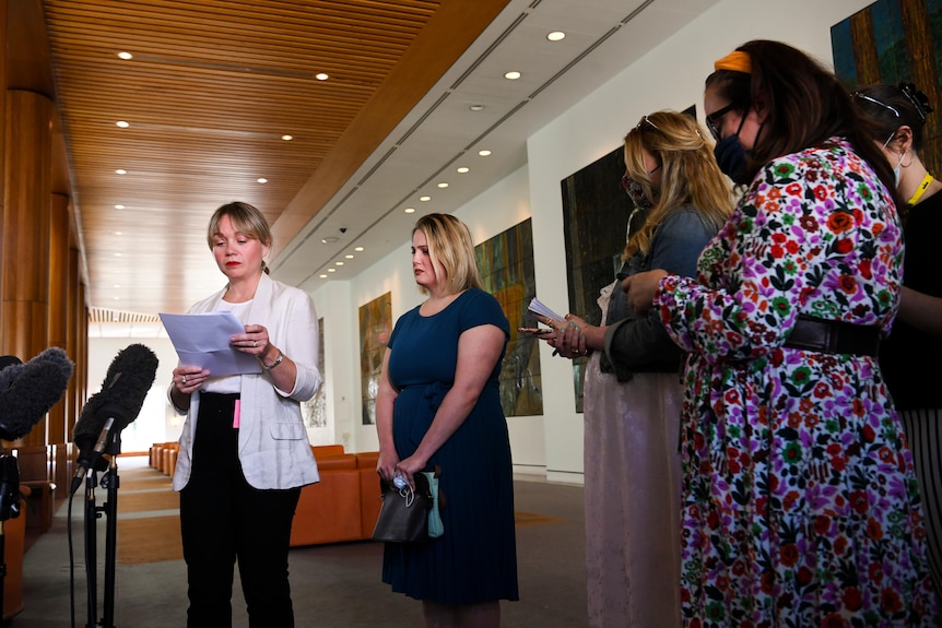 Former staffer Rachelle Miller to Education Minister Alan Tudge speaks to the media during a press conference