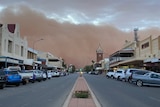 Clouds of orange dust billow toward the main street in Broken Hill