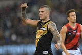 Dustin Martin pumps his fist against Bombers
