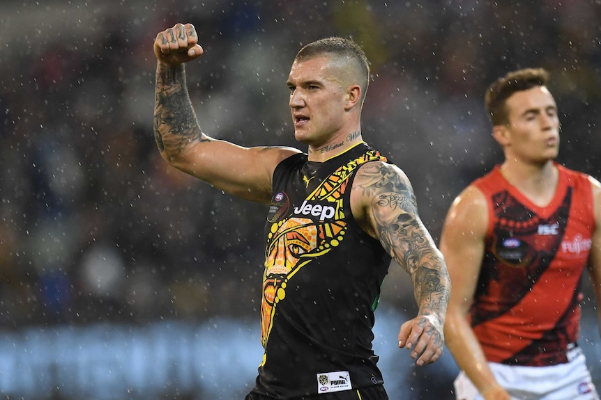 Dustin Martin pumps his fist against Bombers